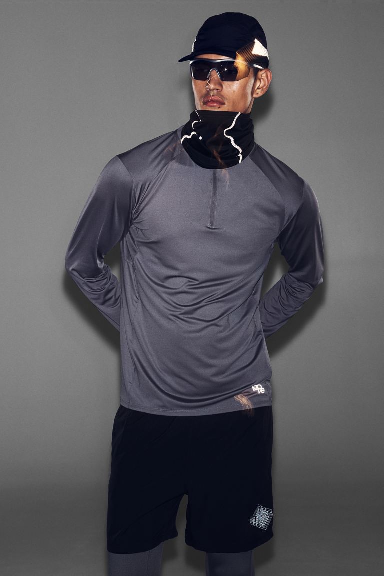 voucher Off DryMove™ Zip-top sports top