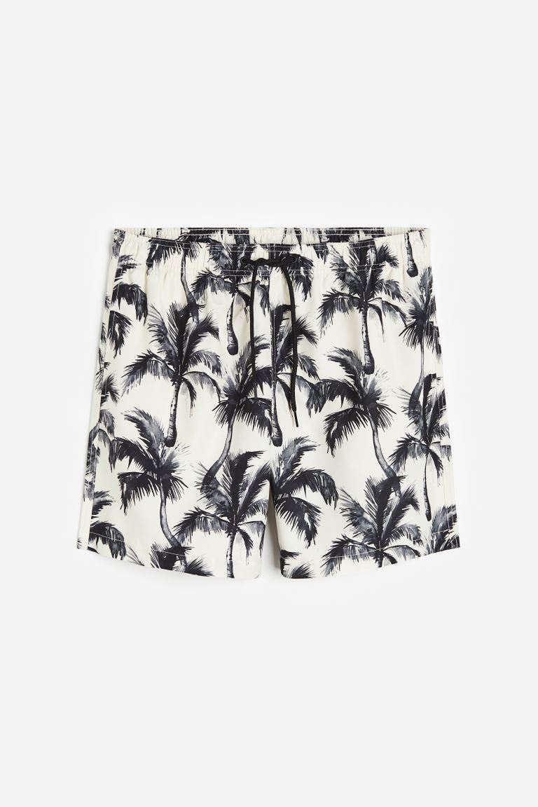 coupon Off Patterned swim shorts